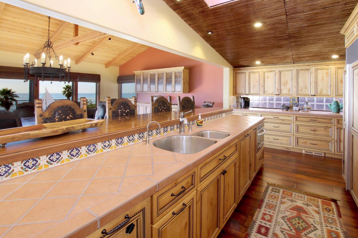 195 Vía Concha Aptos, CA 95003 - Photo 28 of 50 a kitchen with sink and stove