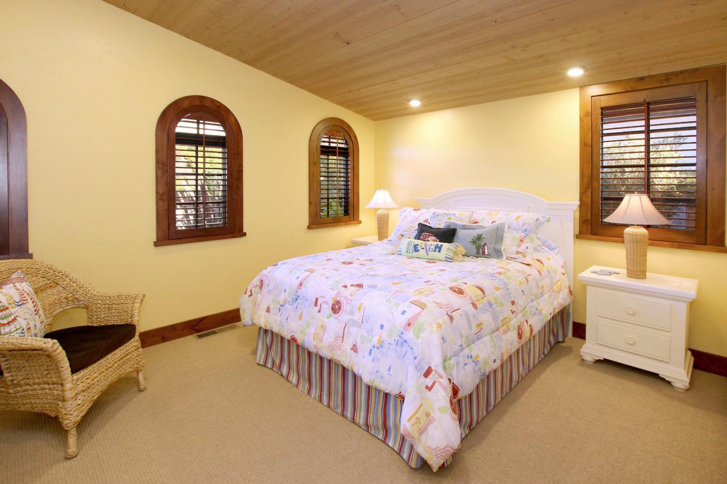 195 Vía Concha Aptos, CA 95003 - Photo 35 of 50 a bedroom with a bed a couch and dresser