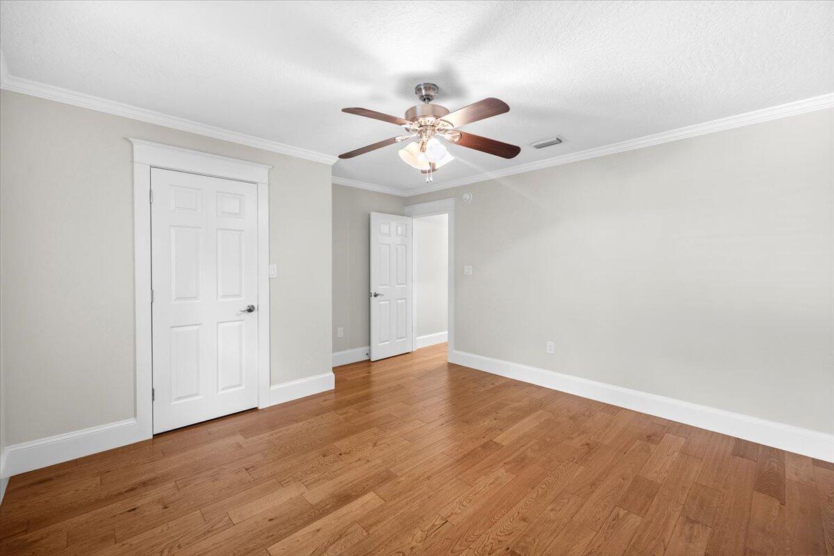 7584 Woodmont Road Navarre, FL 32566 - Photo 30 of 62 a view of an empty room