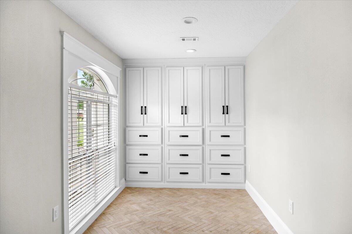 7584 Woodmont Road Navarre, FL 32566 - Photo 41 of 62 a view of an empty room with a window