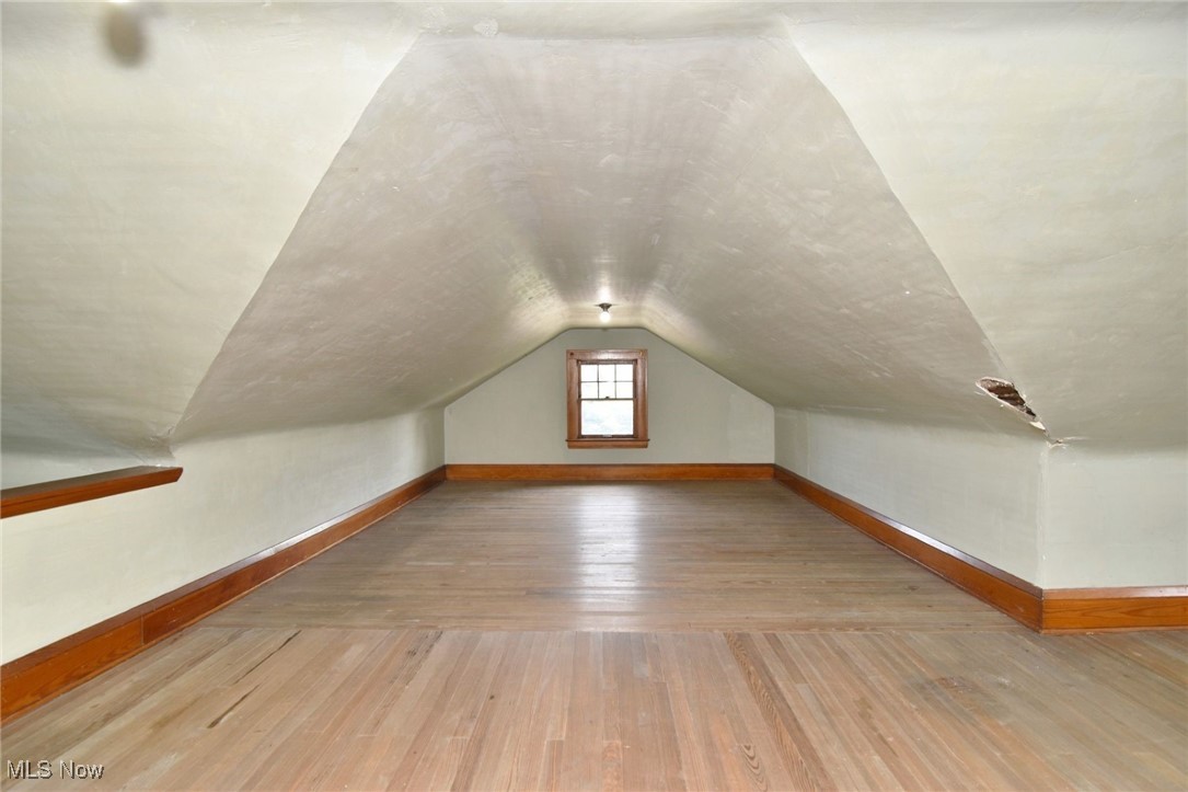 17930 Rosecliff Road Cleveland, OH 44119 - Photo 39 of 50 Bonus room with hardwood / wood-style floors and lofted ceiling
