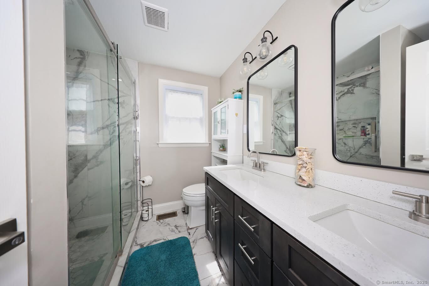 78 Birdseye Road Farmington, CT 06032 - Photo 11 of 28 a spacious bathroom with a double vanity sink a mirror and a shower