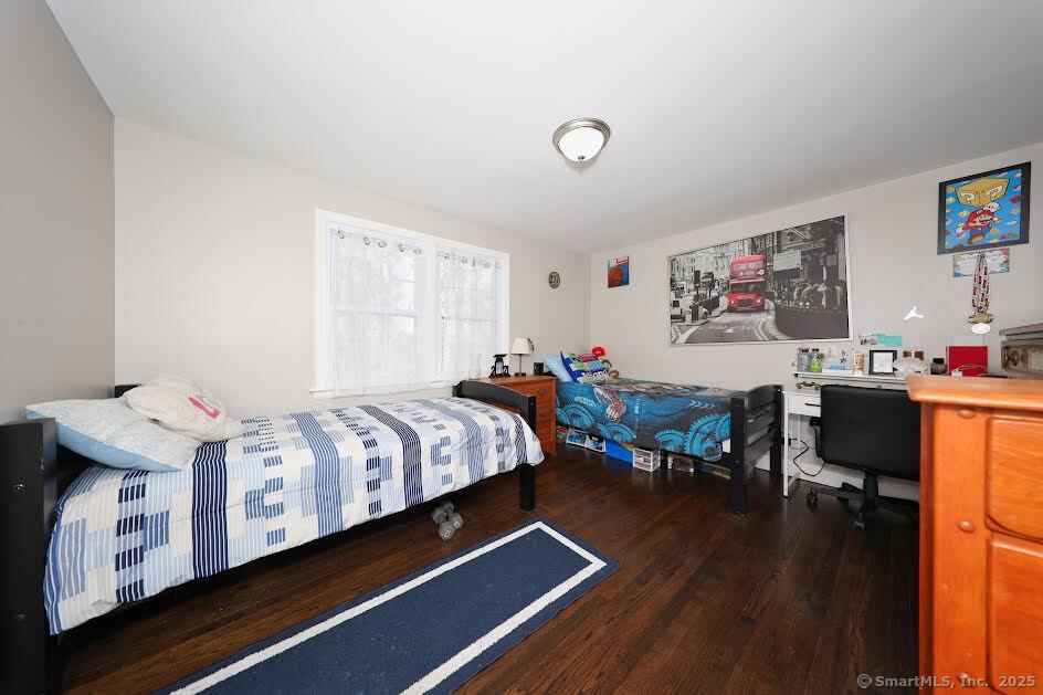 78 Birdseye Road Farmington, CT 06032 - Photo 15 of 28 a bed room with a bed and a couch