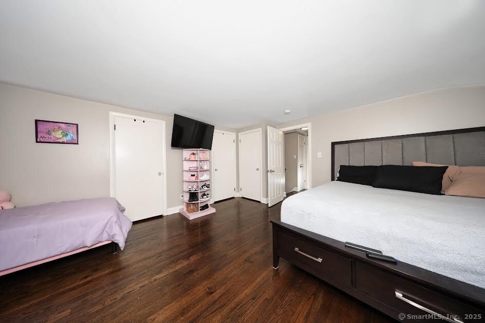 78 Birdseye Road Farmington, CT 06032 - Photo 18 of 28 a bed room with a bed and a television