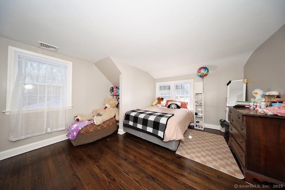 78 Birdseye Road Farmington, CT 06032 - Photo 20 of 28 a bedroom with a bed and wooden floor