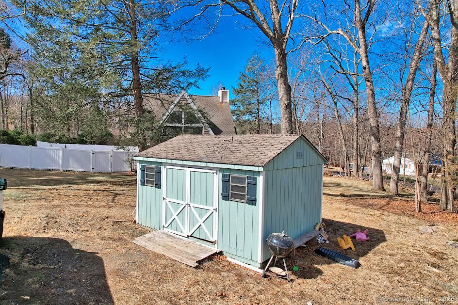 78 Birdseye Road Farmington, CT 06032 - Photo 25 of 28 a view of a house with backyard
