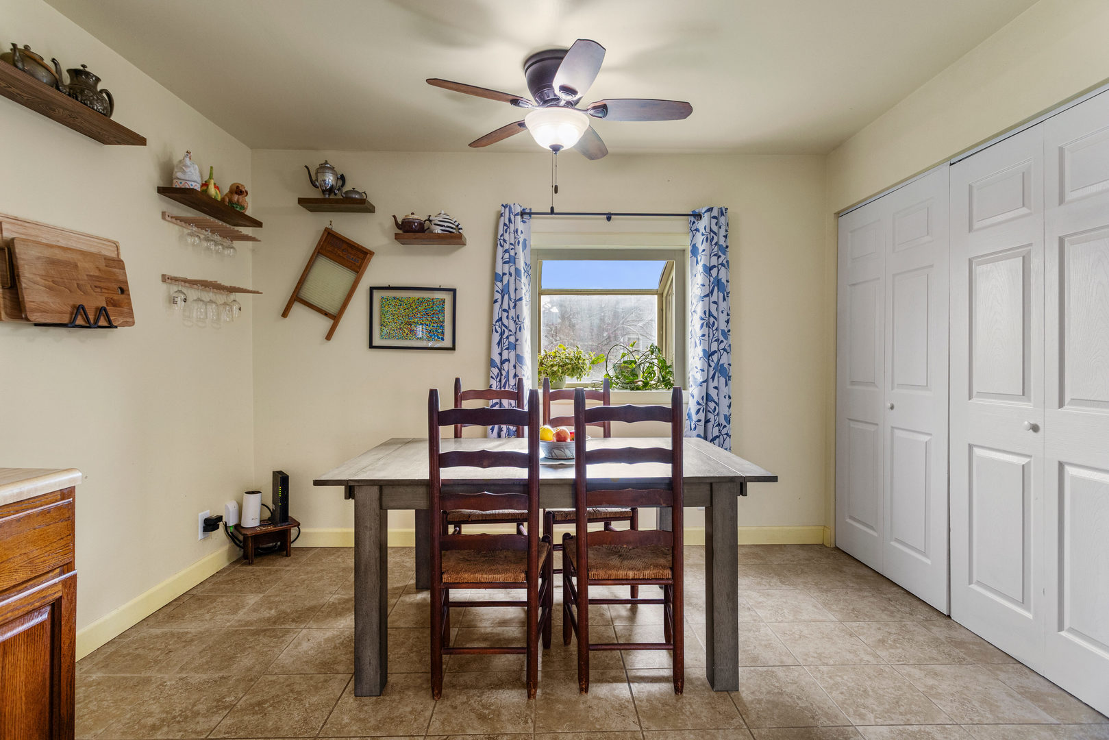 506 East State Street Mahomet, IL 61853 - Photo 16 of 36 a view of a dining room with furniture and a chandelier