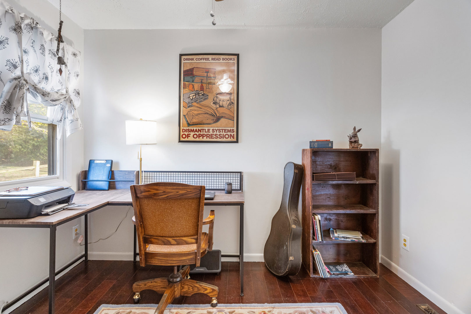 506 East State Street Mahomet, IL 61853 - Photo 21 of 36 a view of a workspace with furniture and a window