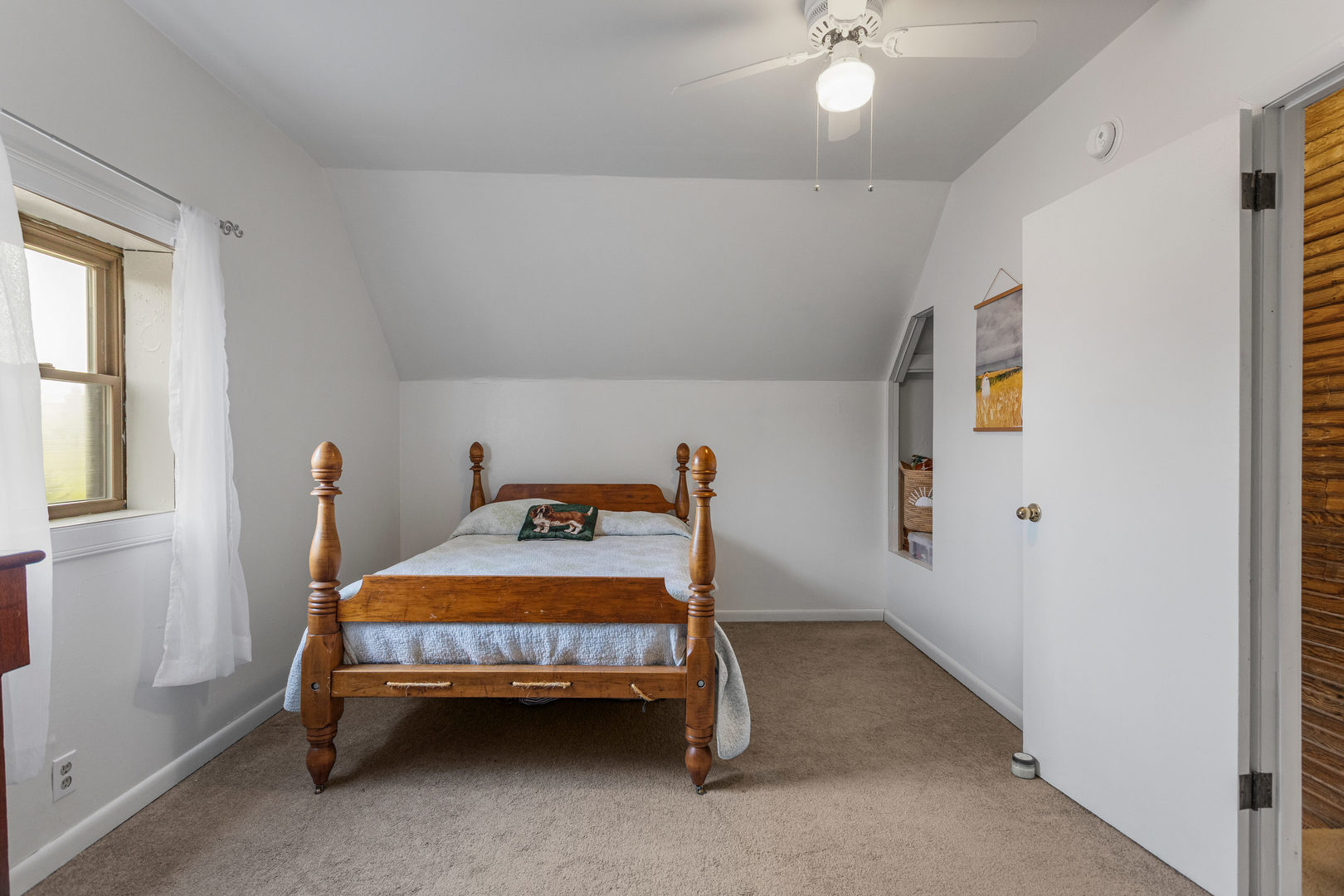 506 East State Street Mahomet, IL 61853 - Photo 29 of 36 a room that has a bed and a chandelier