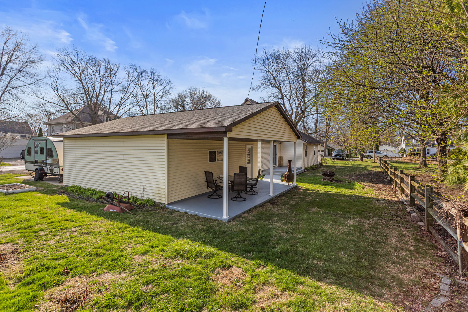 506 East State Street Mahomet, IL 61853 - Photo 33 of 36 a view of a house with backyard and sitting area
