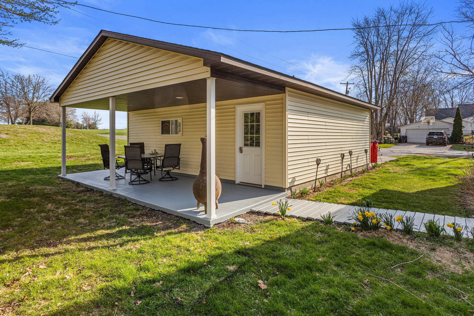 506 East State Street Mahomet, IL 61853 - Photo 34 of 36 a view of a house with backyard and sitting area