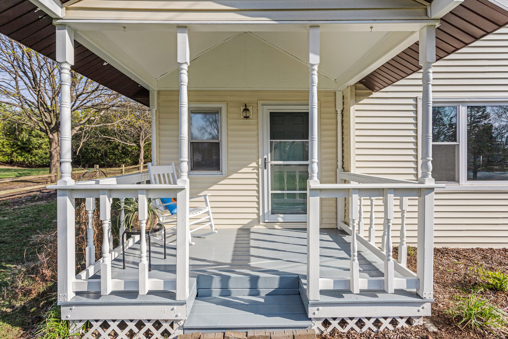 506 East State Street Mahomet, IL 61853 - Photo 4 of 36 a view of a brick house with large windows