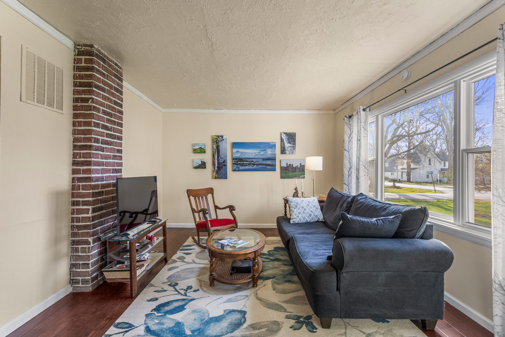 506 East State Street Mahomet, IL 61853 - Photo 7 of 36 a living room with furniture and a large window