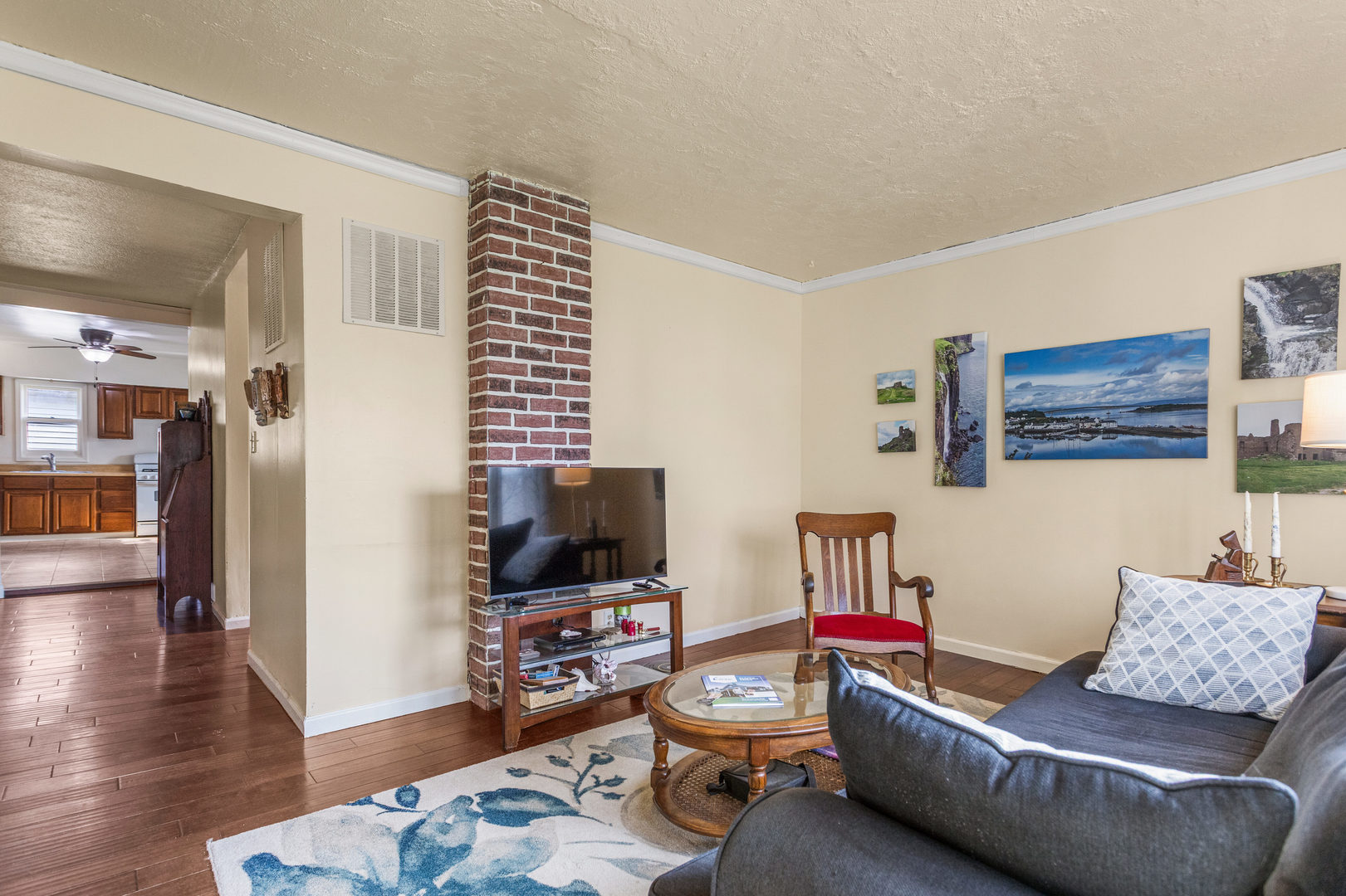 506 East State Street Mahomet, IL 61853 - Photo 9 of 36 a living room with furniture and a flat screen tv