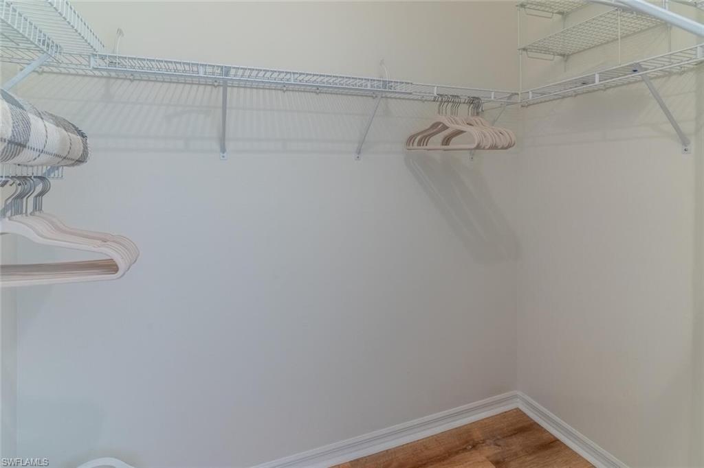 1896 Crestview Way Naples, FL 34119 - Photo 24 of 38 a view of a room with racks on the wall