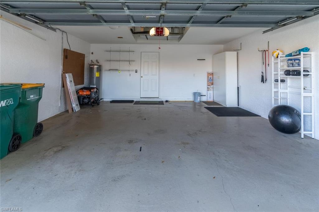 1896 Crestview Way Naples, FL 34119 - Photo 36 of 38 a view of a garage room