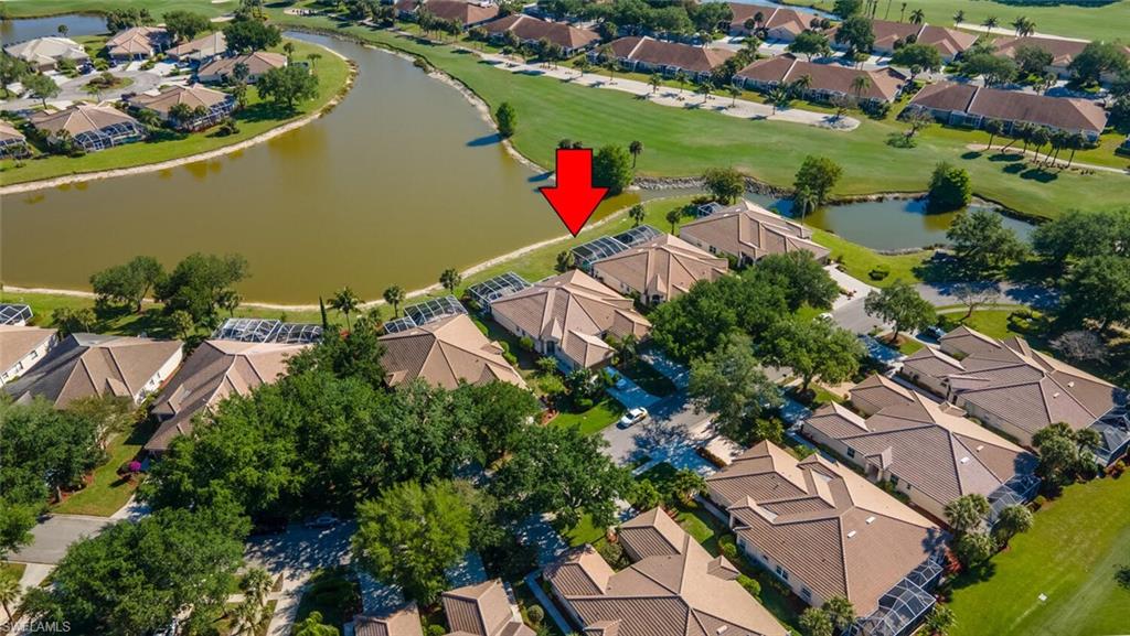 1896 Crestview Way Naples, FL 34119 - Photo 38 of 38 an aerial view of residential houses with outdoor space and lake view