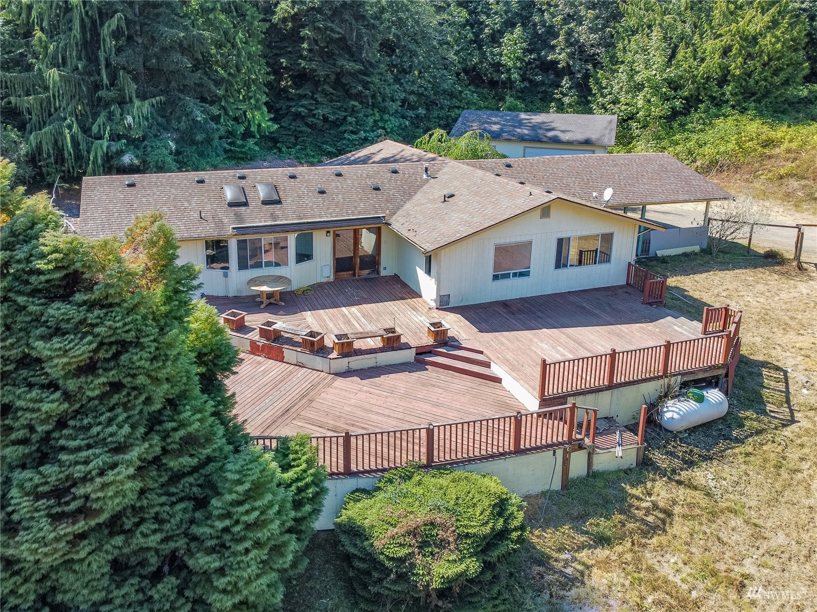 2230 West Valley Road Chimacum, WA 98325 - Photo 1 of 22 an aerial view of a house with garden space and street view
