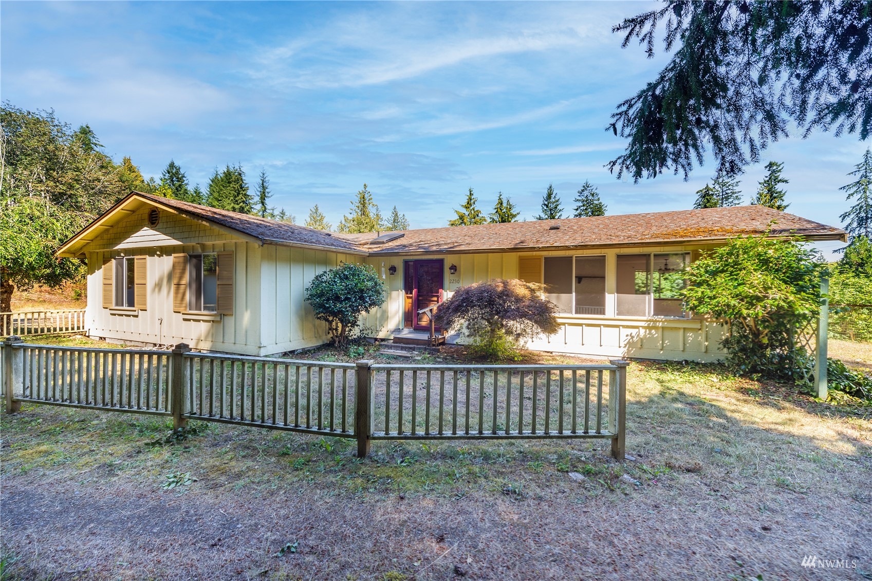 2230 West Valley Road Chimacum, WA 98325 - Photo 14 of 22 a view of a house with a small yard and furniture