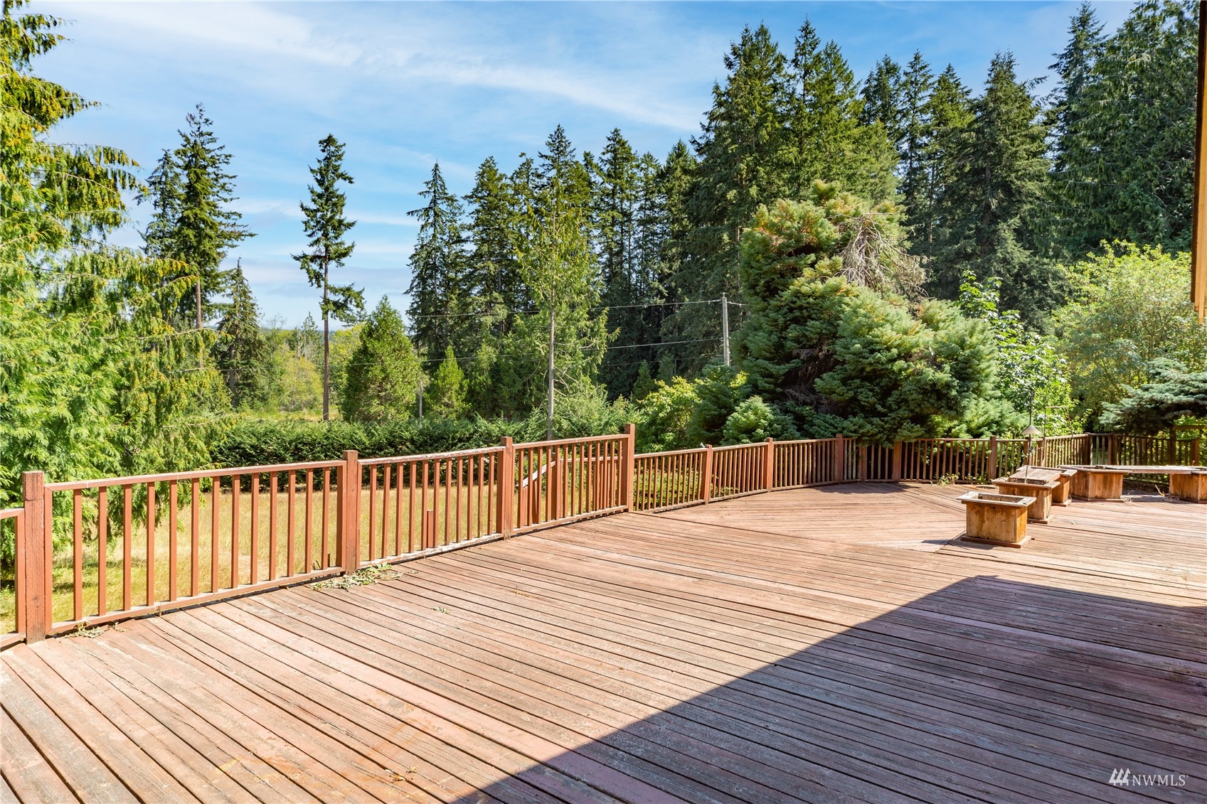2230 West Valley Road Chimacum, WA 98325 - Photo 17 of 22 a view of a patio with wooden floor and fence