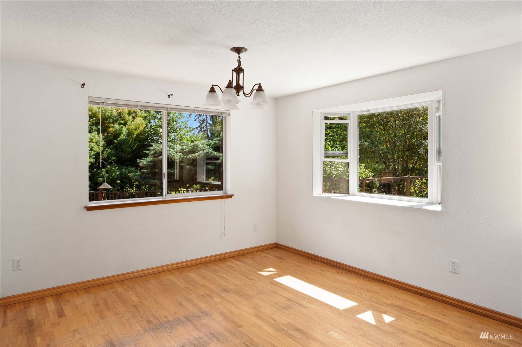 2230 West Valley Road Chimacum, WA 98325 - Photo 5 of 22 a view of an empty room with a window