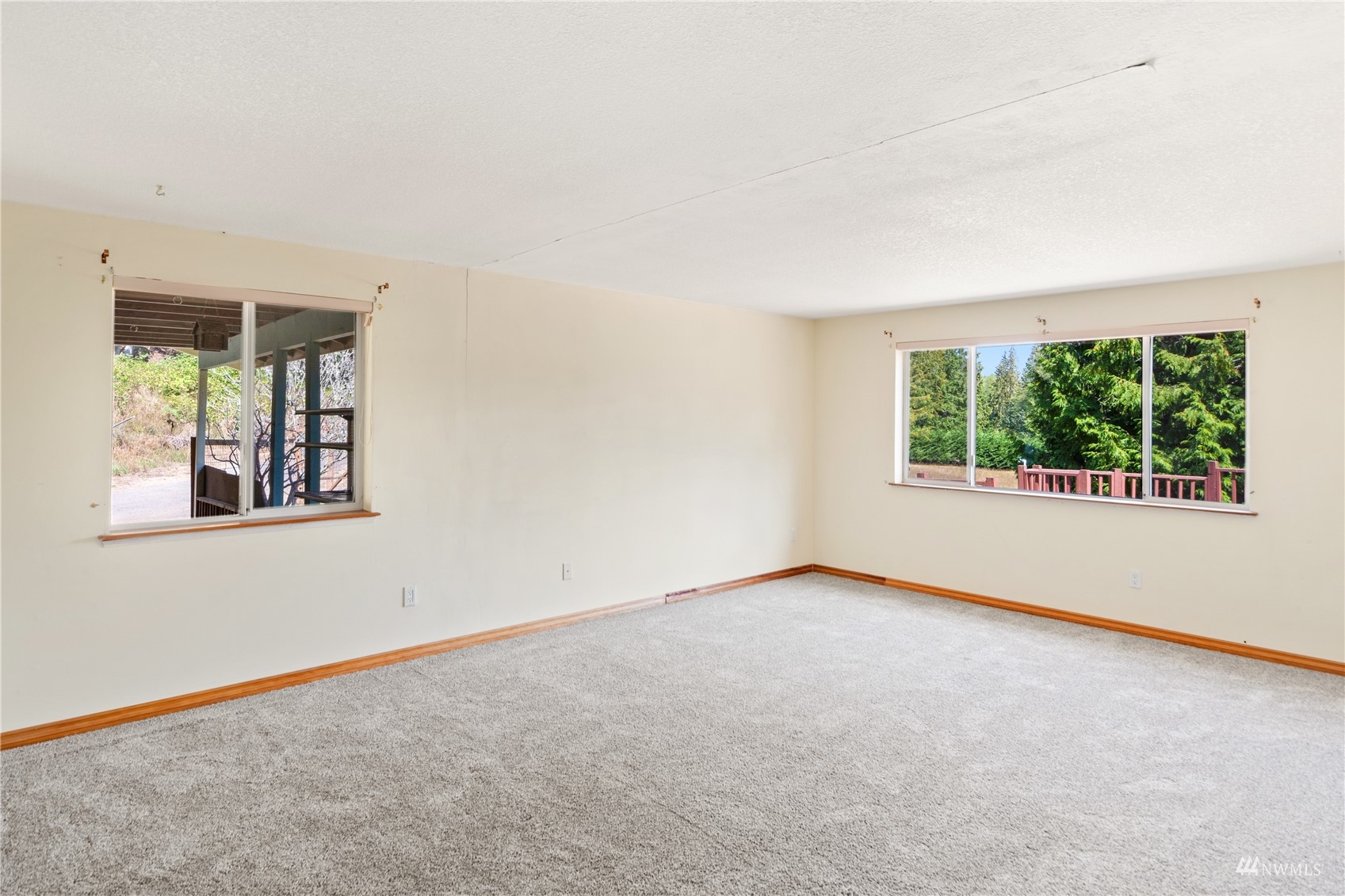2230 West Valley Road Chimacum, WA 98325 - Photo 8 of 22 an empty room with windows