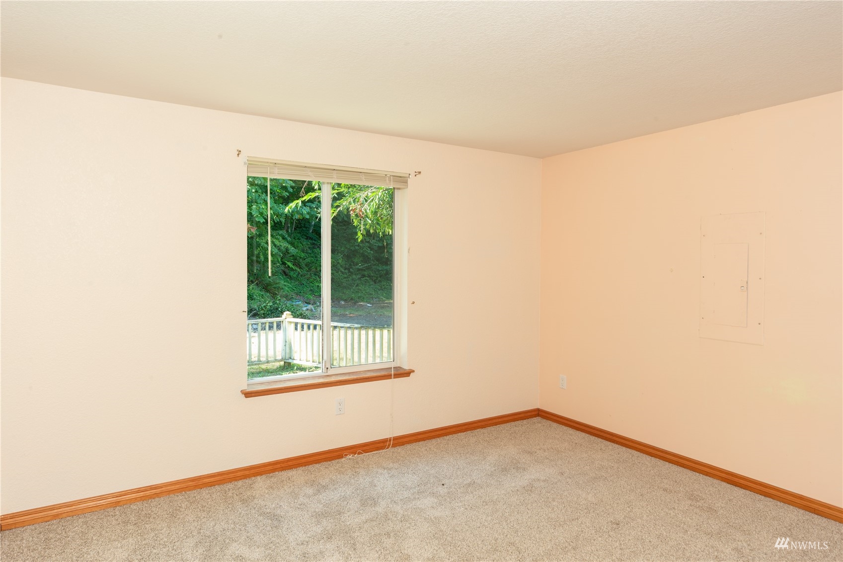 2230 West Valley Road Chimacum, WA 98325 - Photo 10 of 22 a view of an empty room with a window