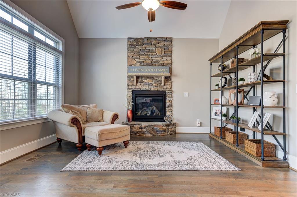 7500 Hearthridge Court Oak Ridge, NC 27310 - Photo 12 of 30 Enjoy the stone gas fireplace in your keeping room. A perfect place to unwind and relax!