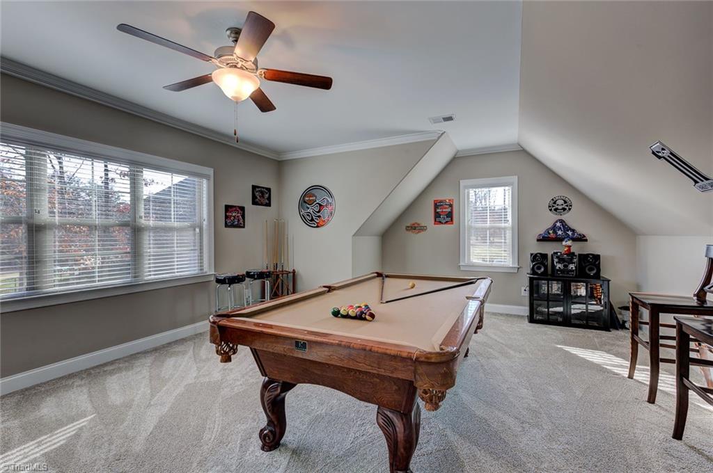 7500 Hearthridge Court Oak Ridge, NC 27310 - Photo 23 of 30 Expansive bonus room. Home also has a walk in attic.