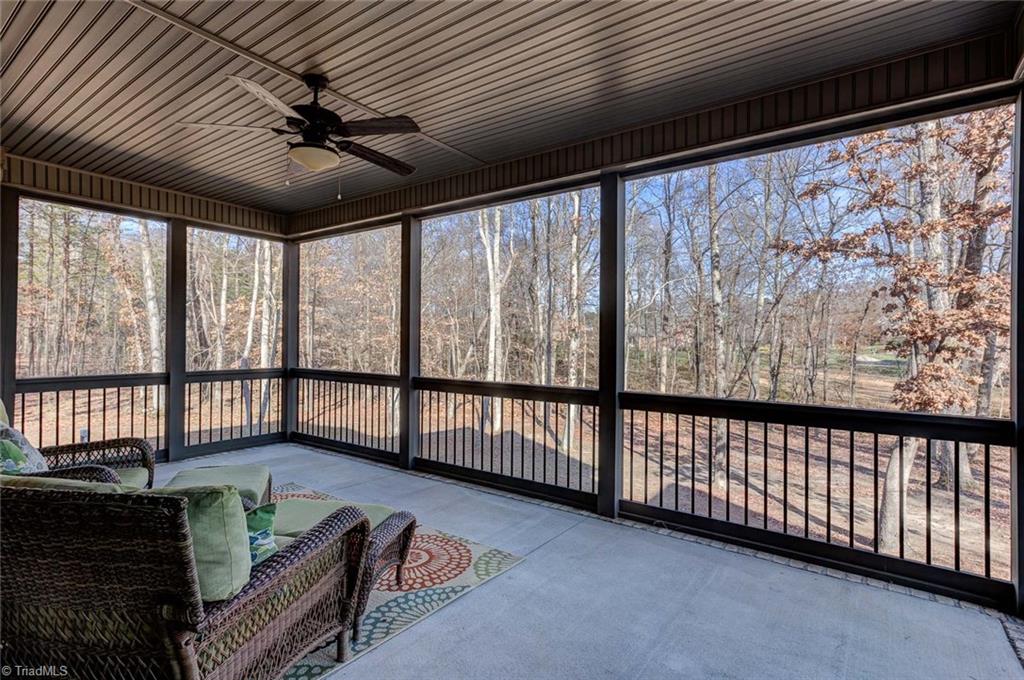 7500 Hearthridge Court Oak Ridge, NC 27310 - Photo 26 of 30 Screened porch overlooks a private back yard. This home has 1.24 acres at the end of a cul-de-sac!