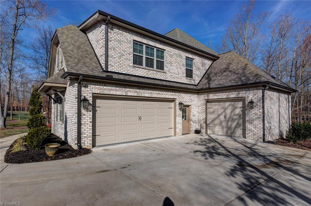 7500 Hearthridge Court Oak Ridge, NC 27310 - Photo 28 of 30 The three car garage.