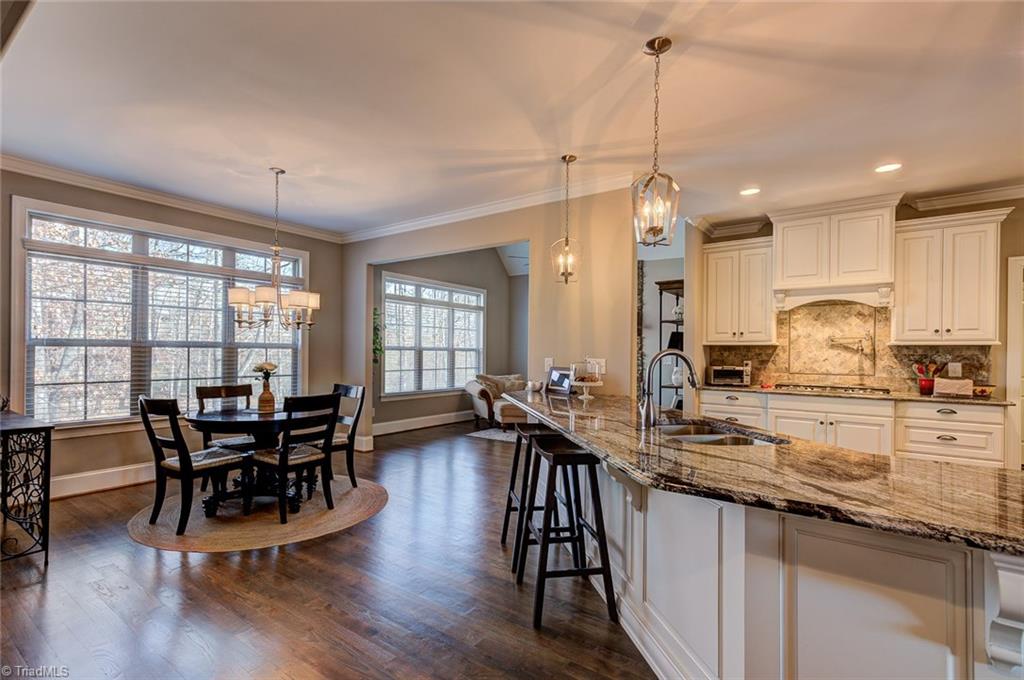 7500 Hearthridge Court Oak Ridge, NC 27310 - Photo 7 of 30 Spacious kitchen and breakfast area.