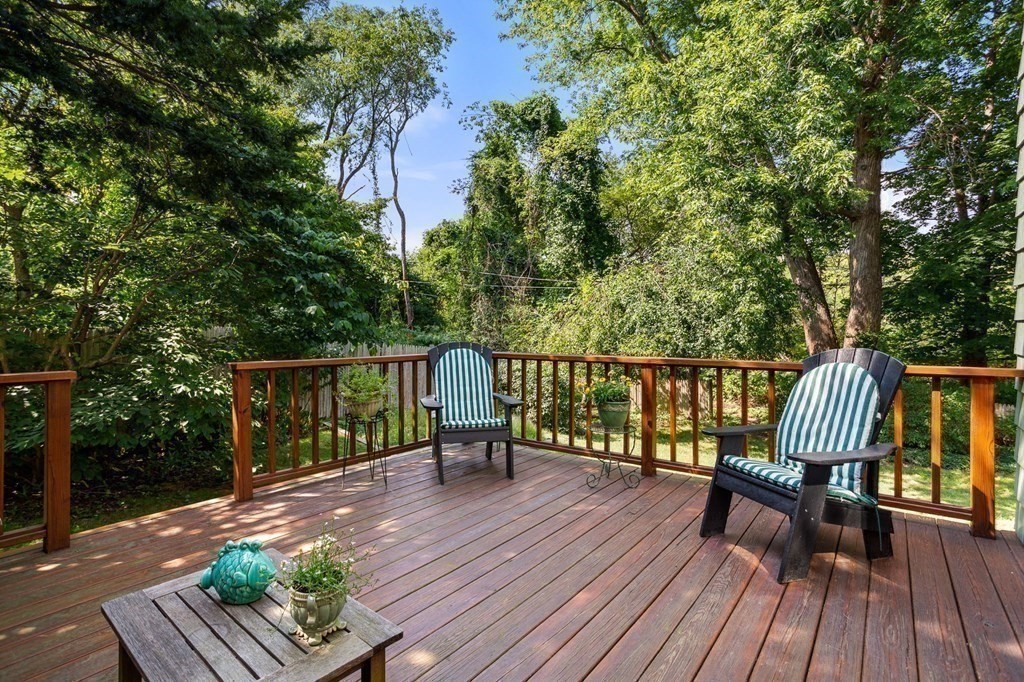 14 Rainbow Road Marblehead, MA 01945 - Photo 11 of 41 a view of a wooden deck with a bench