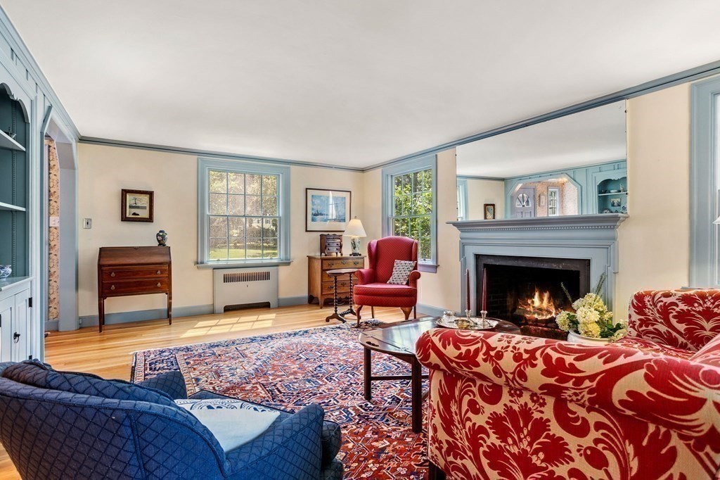14 Rainbow Road Marblehead, MA 01945 - Photo 16 of 41 a living room with furniture and a fireplace