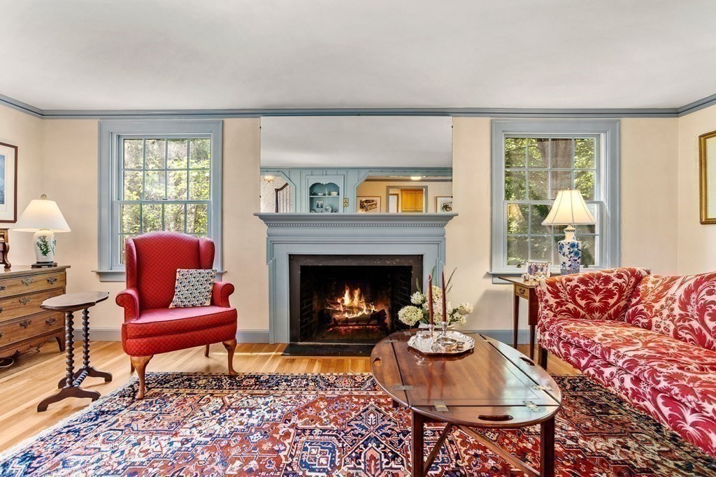 14 Rainbow Road Marblehead, MA 01945 - Photo 17 of 41 a living room with furniture and a fireplace