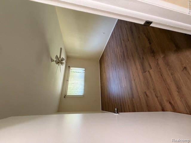 43038 Hanford Road Canton, MI 48187 - Photo 23 of 36 Room featuring wood-finish flooring, a window with blinds, a ceiling fan, and light-toned walls
