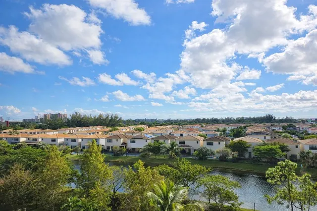 a view of city and green space