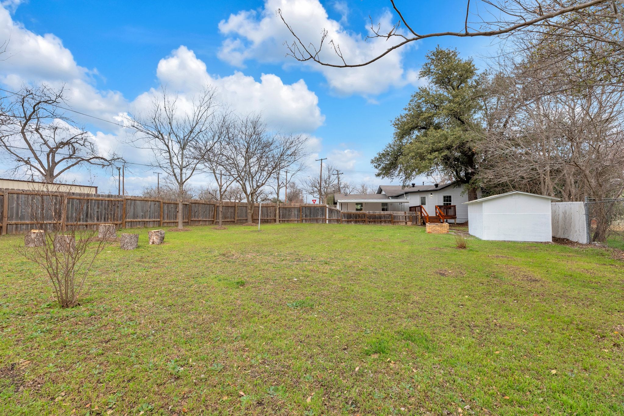 1709 Cecelia Street Taylor, TX 76574 - Photo 33 of 37 View of fenced backyard