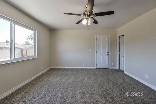 240 West Benson Avenue Ridgecrest, CA 93555 - Photo 21 of 29 a view of an empty room with a window