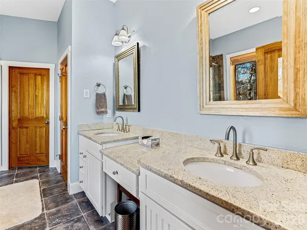 a view of a livingroom with furniture and window