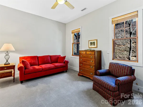 a view of a two chairs in the roof deck