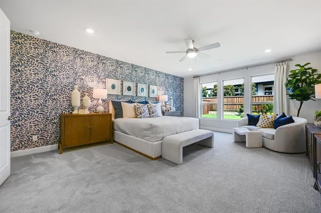 a bed room with a bed and a couch