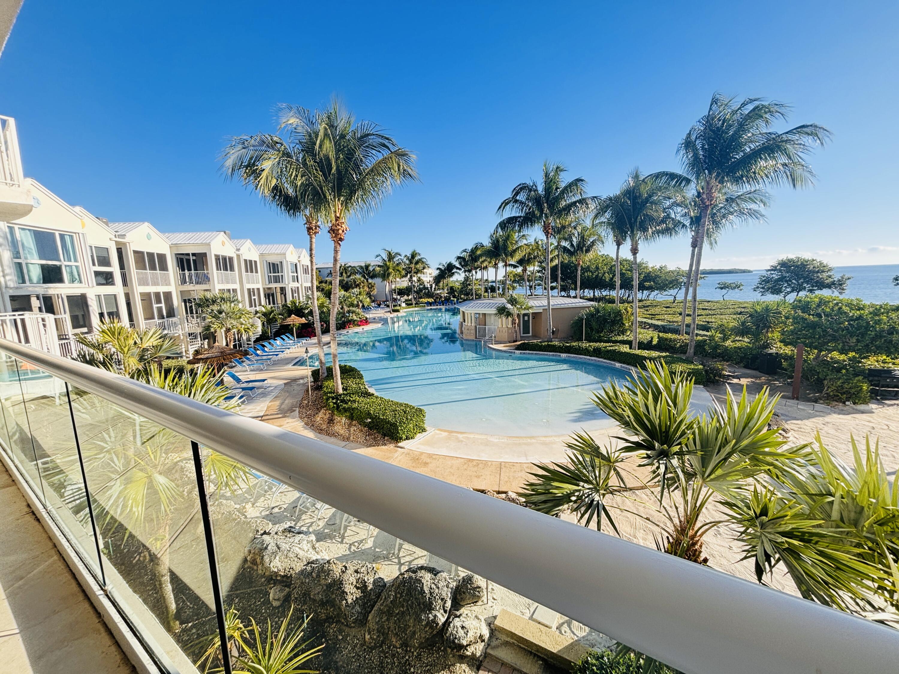 97501 Overseas Highway, Unit 521 Key Largo, FL 33037 - Photo 18 of 38 Impact windows-glass enclosure terrace