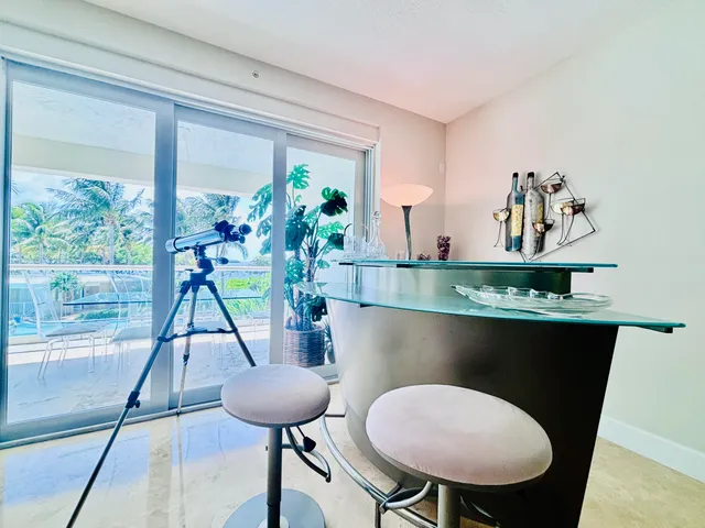 a view of a garage with a table and chairs