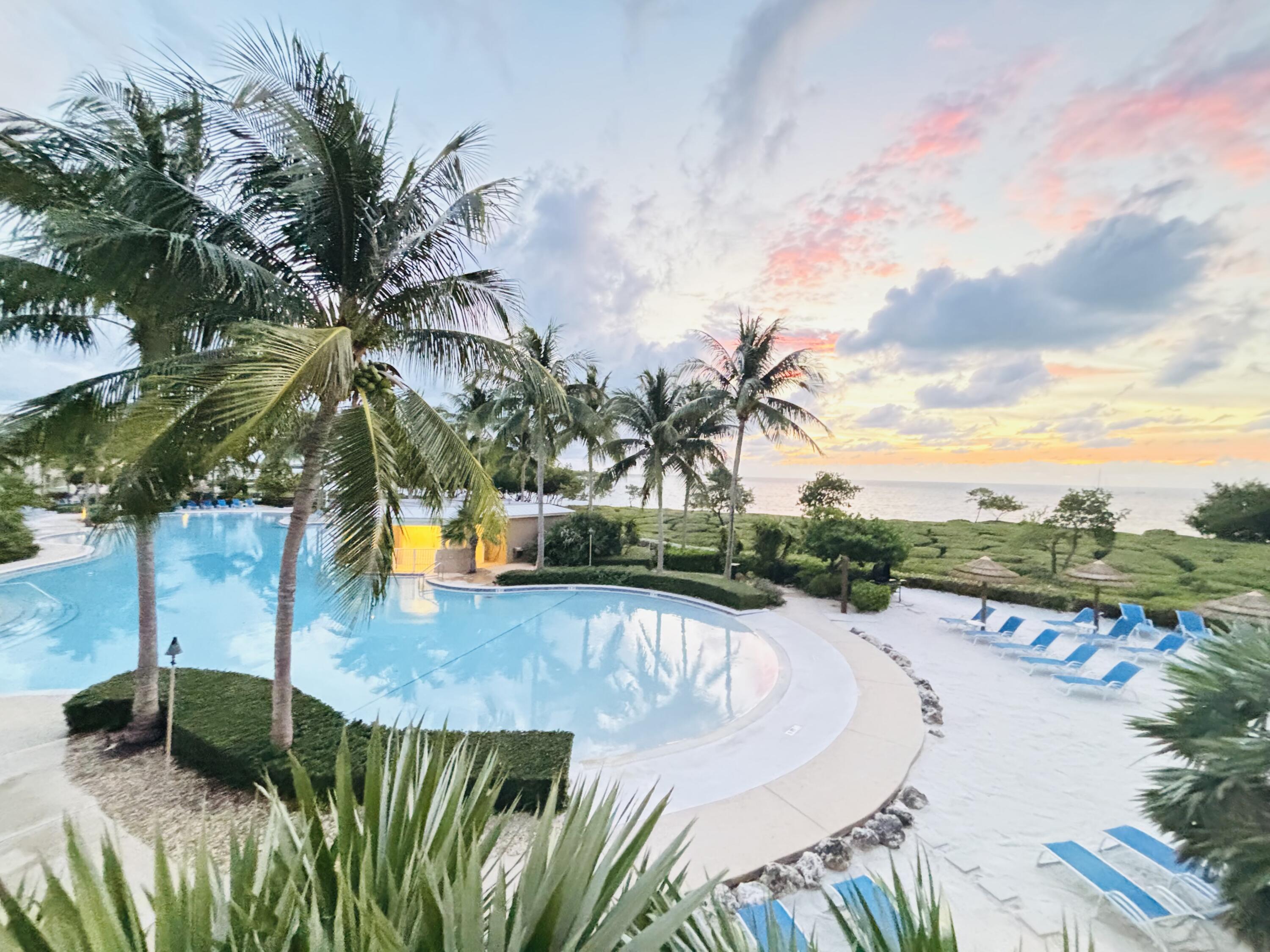 97501 Overseas Highway, Unit 521 Key Largo, FL 33037 - Photo 8 of 38 Hues of pink yrllow orange and blue