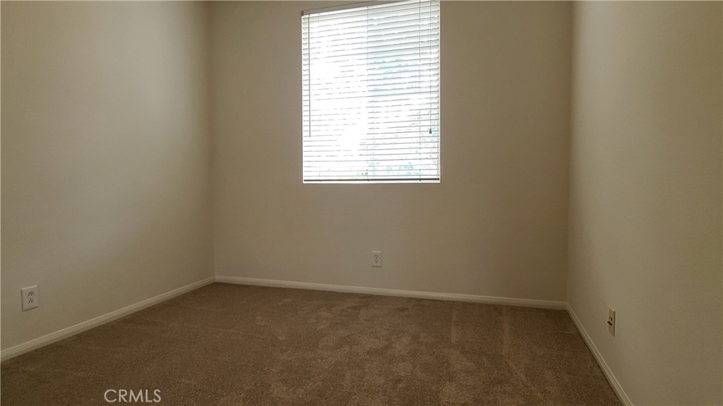 9 Garrison Loop Ladera Ranch, CA 92694 - Photo 13 of 20 an empty room with a window