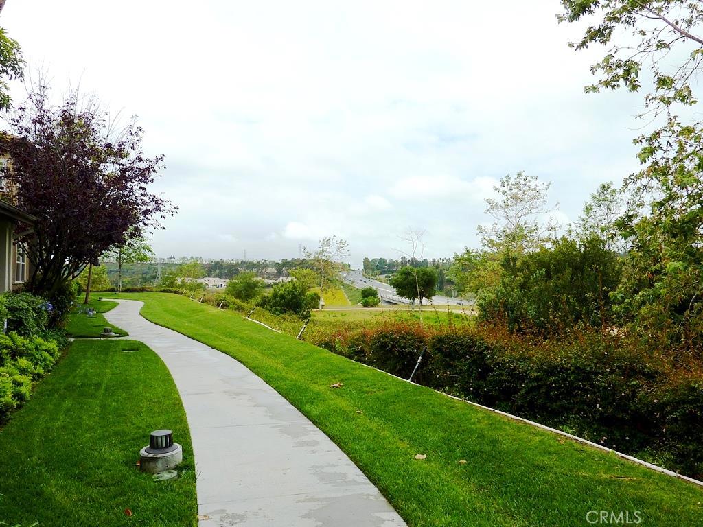 9 Garrison Loop Ladera Ranch, CA 92694 - Photo 19 of 20 a view of a lake with a yard