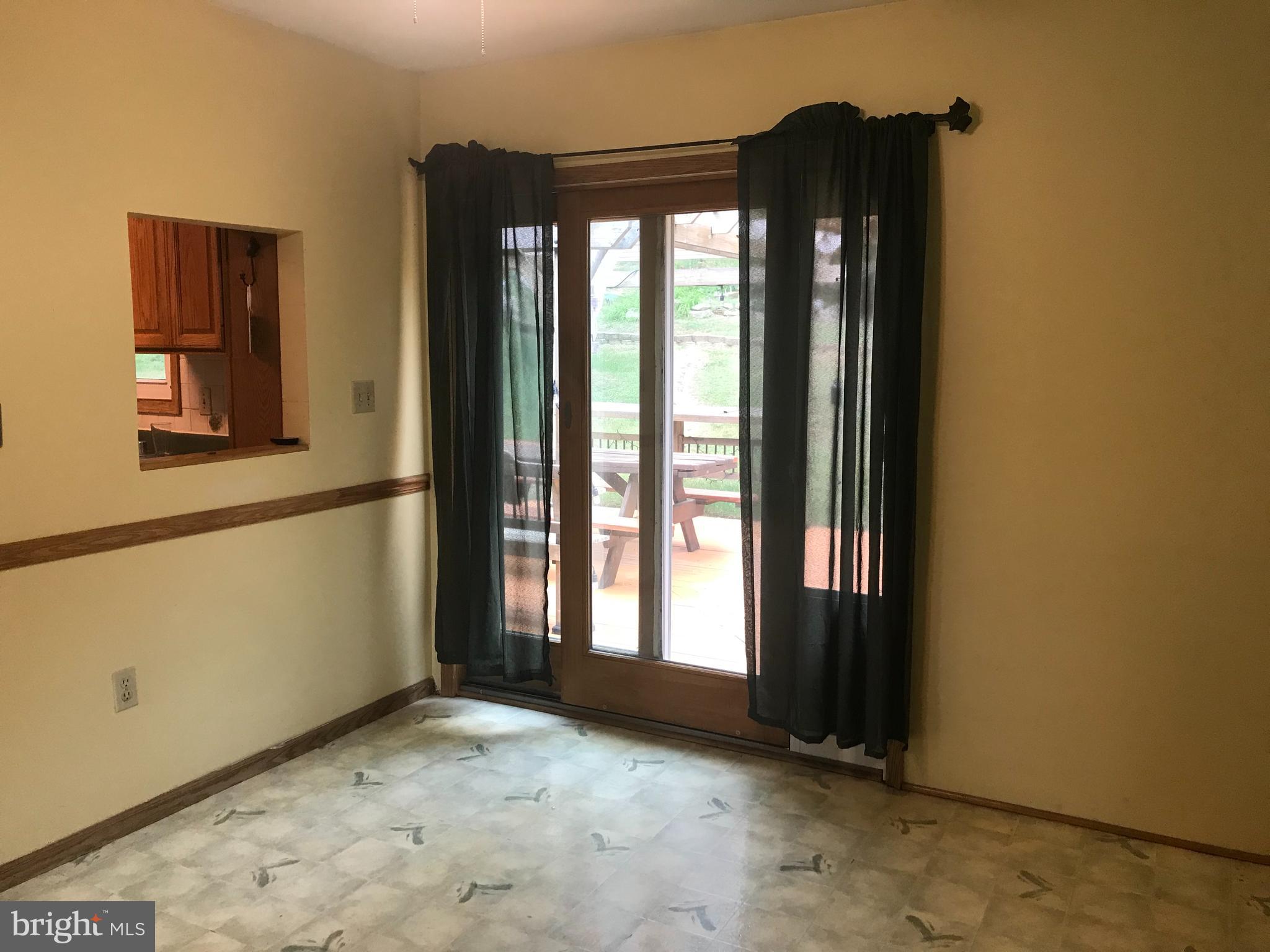 19106 Lappans Road Boonsboro, MD 21713 - Photo 12 of 53 Patio doors from dining room onto deck.