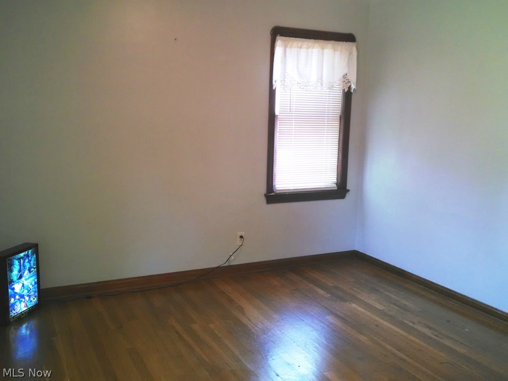 1404 South Green Road Cleveland, OH 44121 - Photo 9 of 23 First floor bedroom (2 windows, one closet)