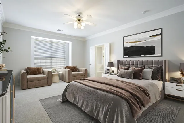 a bedroom with bed and a couch